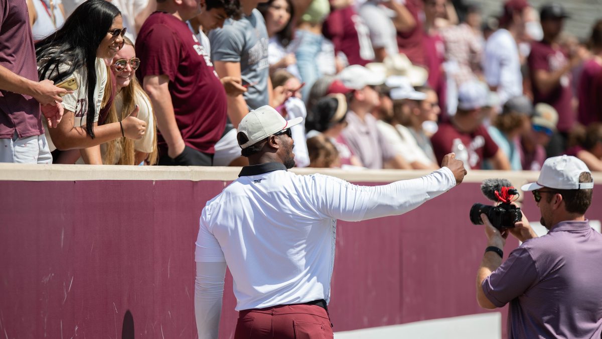 Former A&M football player Von Miller visits with fans during the Maroon & White Spring Game at Kyle Field on Saturday, April 15, 2023.