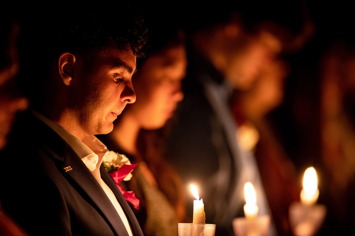 <p>A candleholder sheds a tear at Muster in Reed Arena on Friday, April 21, 2023.</p>