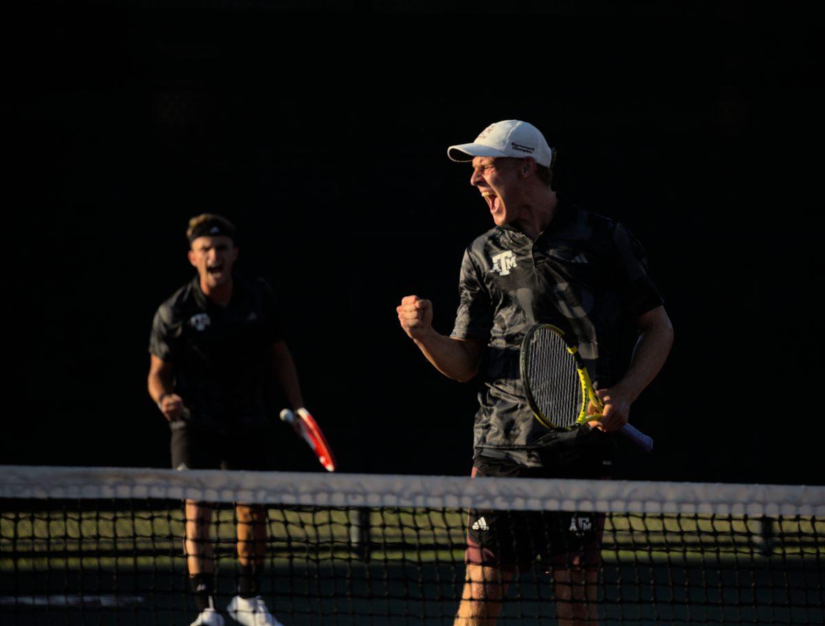 Junior Kenner Taylor (front right) and Junior Rahael Perot (back left) celebrate another point over South Carolina in their doubles match at the Mitchell Outdoor Tennis Center on April 13, 2023.