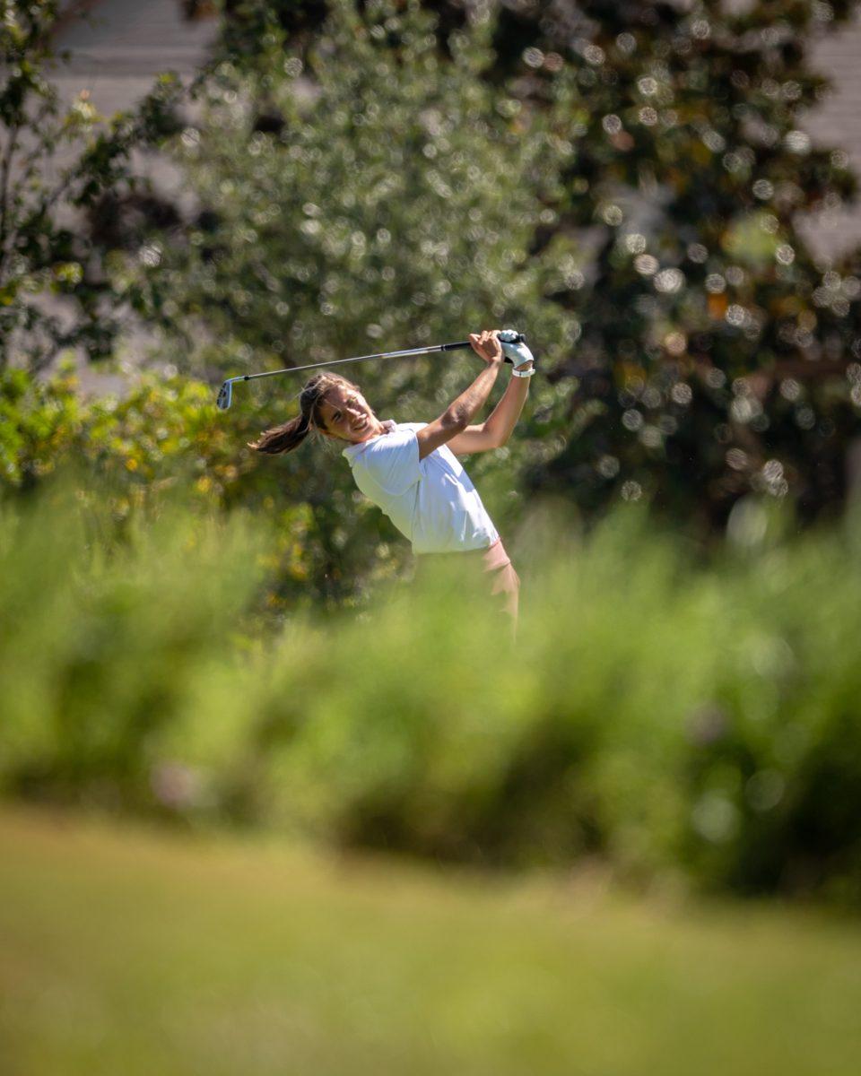 <p>Senior Blanca Fernández García-Poggio plays her tee shot on the 16th hole of the Traditions Club on the second day of the 