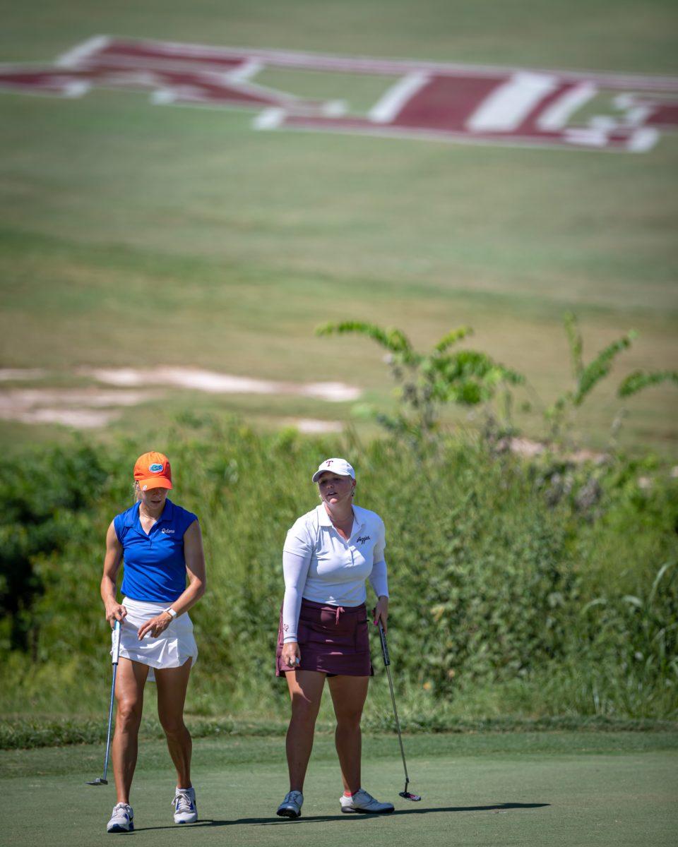 Graduate Hailee Cooper and Florida senior Annabell Fuller line up their shots on the 18th hole of the Traditions Club on the second day of the Momorial Invitational on Wednesday, Sept. 21, 2022 in Bryan, Texas.