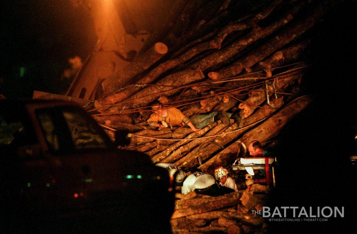 ( JP Beato III / The Battalion / AP ) Seventeen-year old freshman Tim Kerlee waits for help while rescue workers tend to another injured person after the Texas A&amp;M University Bonfire stack collapsed around 2:45 a.m. Thursday, November 18,1999 in College Station. Kerlee, a member of Squadron 16 of the Corps of Cadets, from Germantown, Tennessee, had been working on the stack when it collapsed. Kerlee was hospitalized in critical condition late Thursday and died in the hospital after being removed from life support. He was the twelfth student to die in the accident.