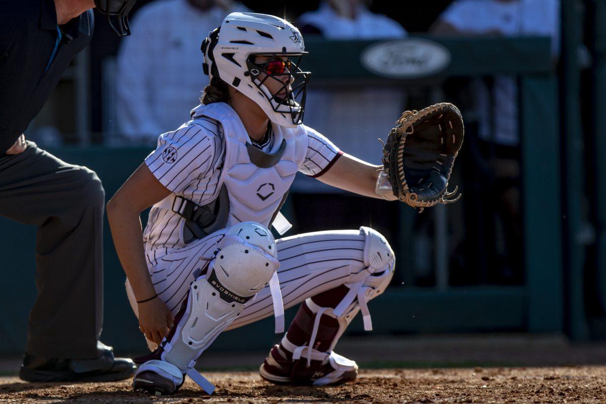 Freshman C Riely Valentine (27) gets ready to catch softball prior to pitch during Texas A&Ms game against Mizzou at Davis Diamond on Sunday, April 30, 2023.
