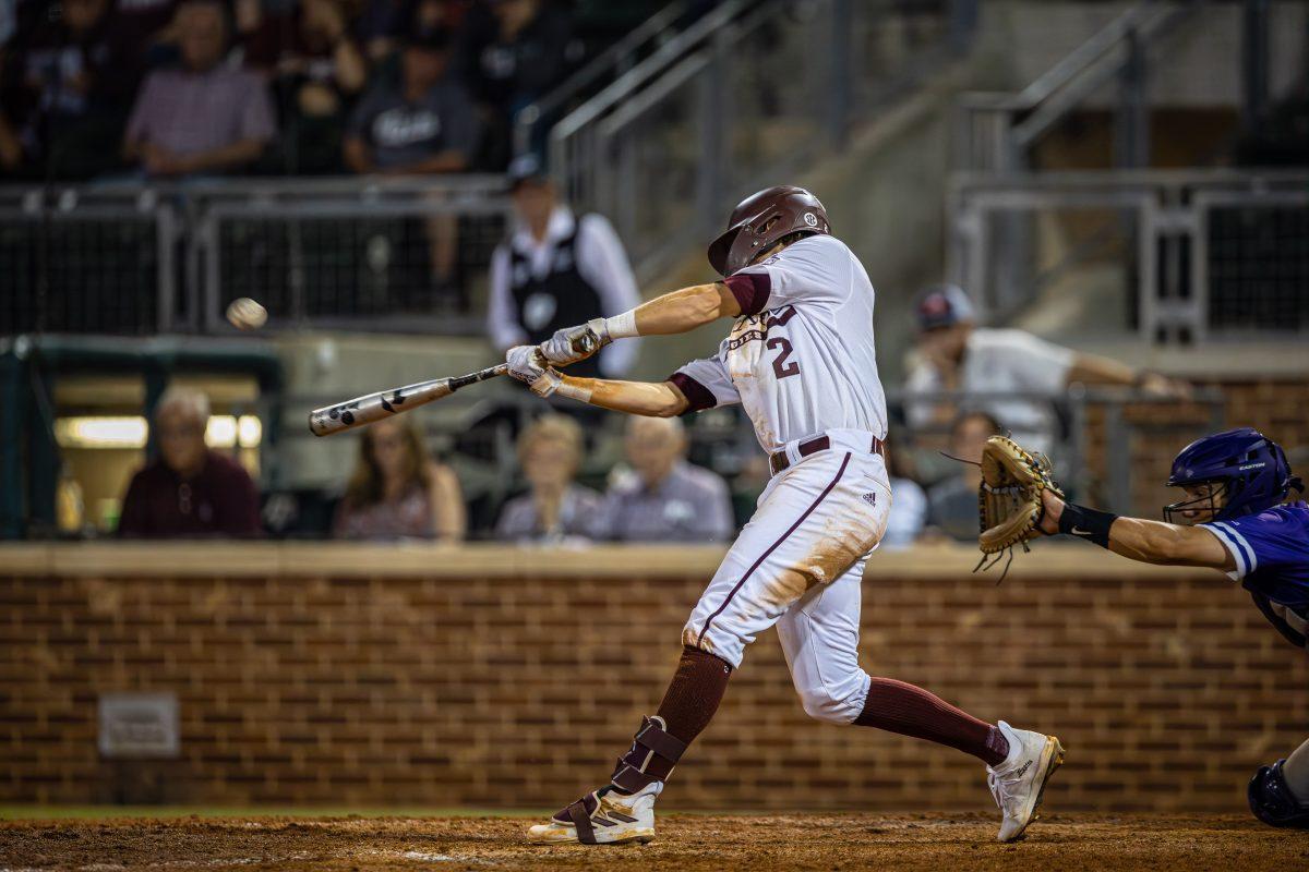 Junior SS Hunter Haas (2) hits a 3 RBI home run to give the Aggies the lead in the bottom of the 8th during Texas A&amp;M's game against Tarleton at Olsen Field on Tuesday, May 2, 2023.