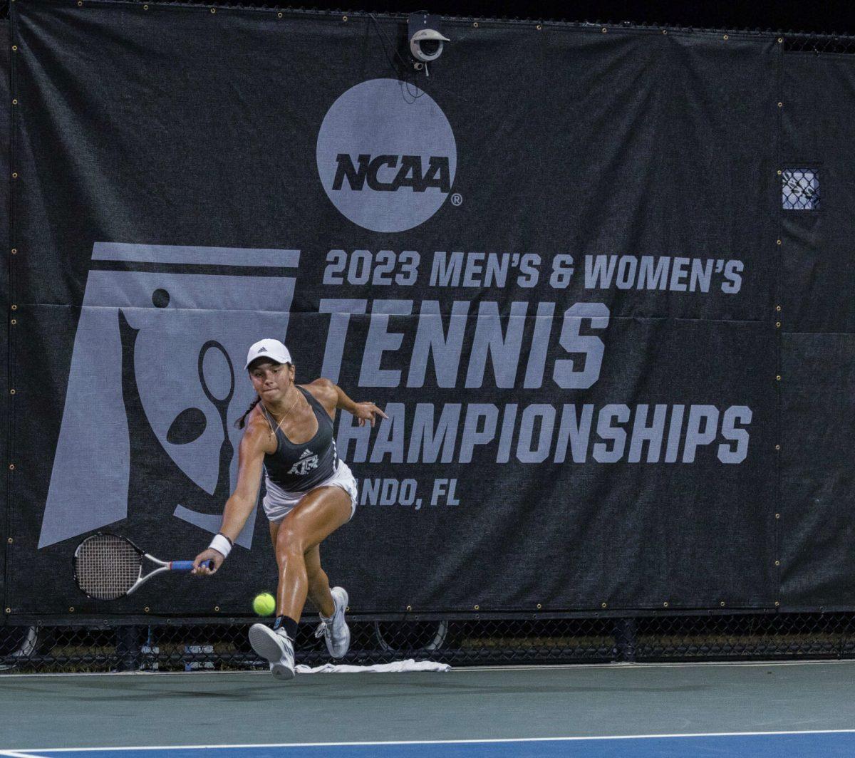 Freshman Mia Kupres hits the ball underhand during a game vs. Stanford at the NCAA Womens tennis quarterfinals in Orlando, Florida on Wednesday, May 17, 2023.