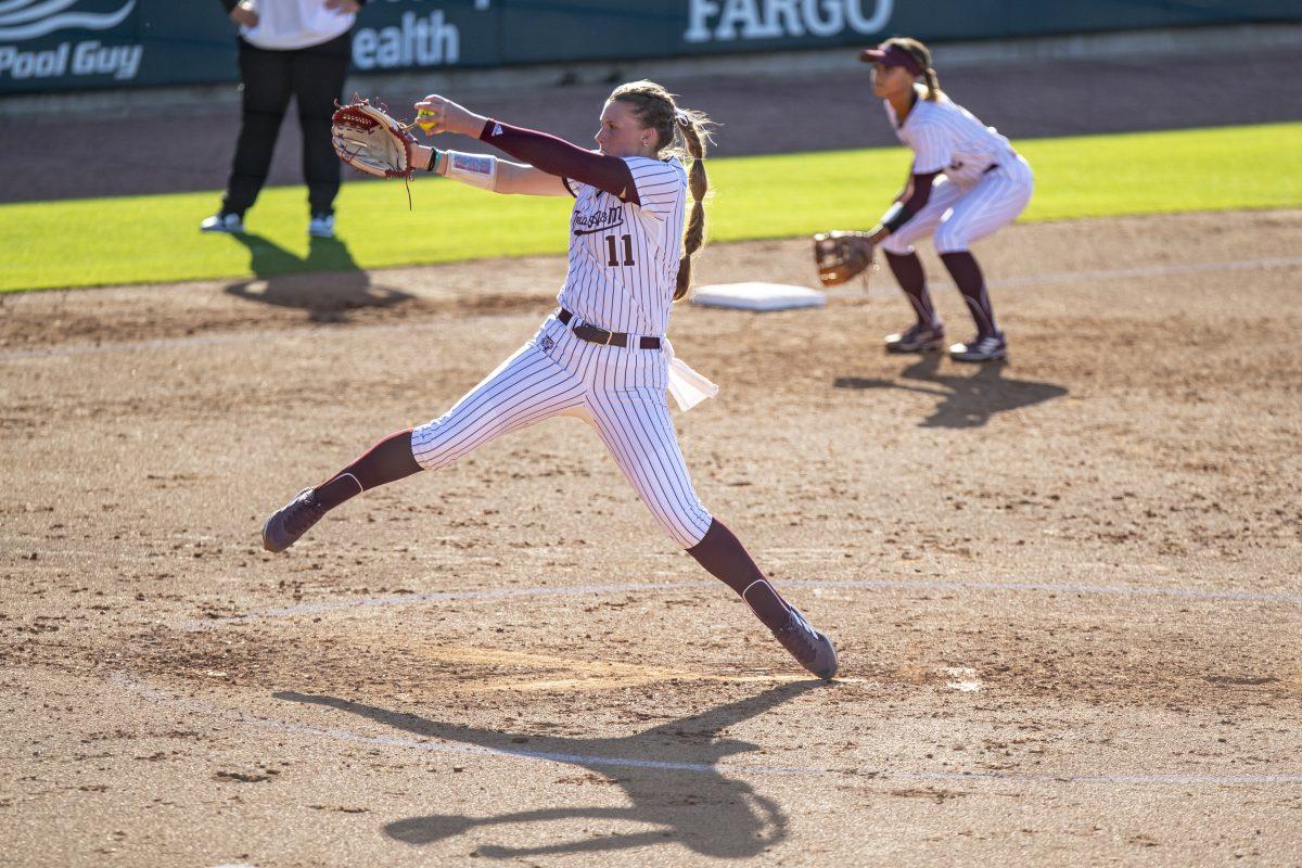 Sophomore LHP Emiley Kennedy (11) winds up to pitch during Texas A&Ms game against Mizzou at Davis Diamond on Sunday, April 30, 2023.