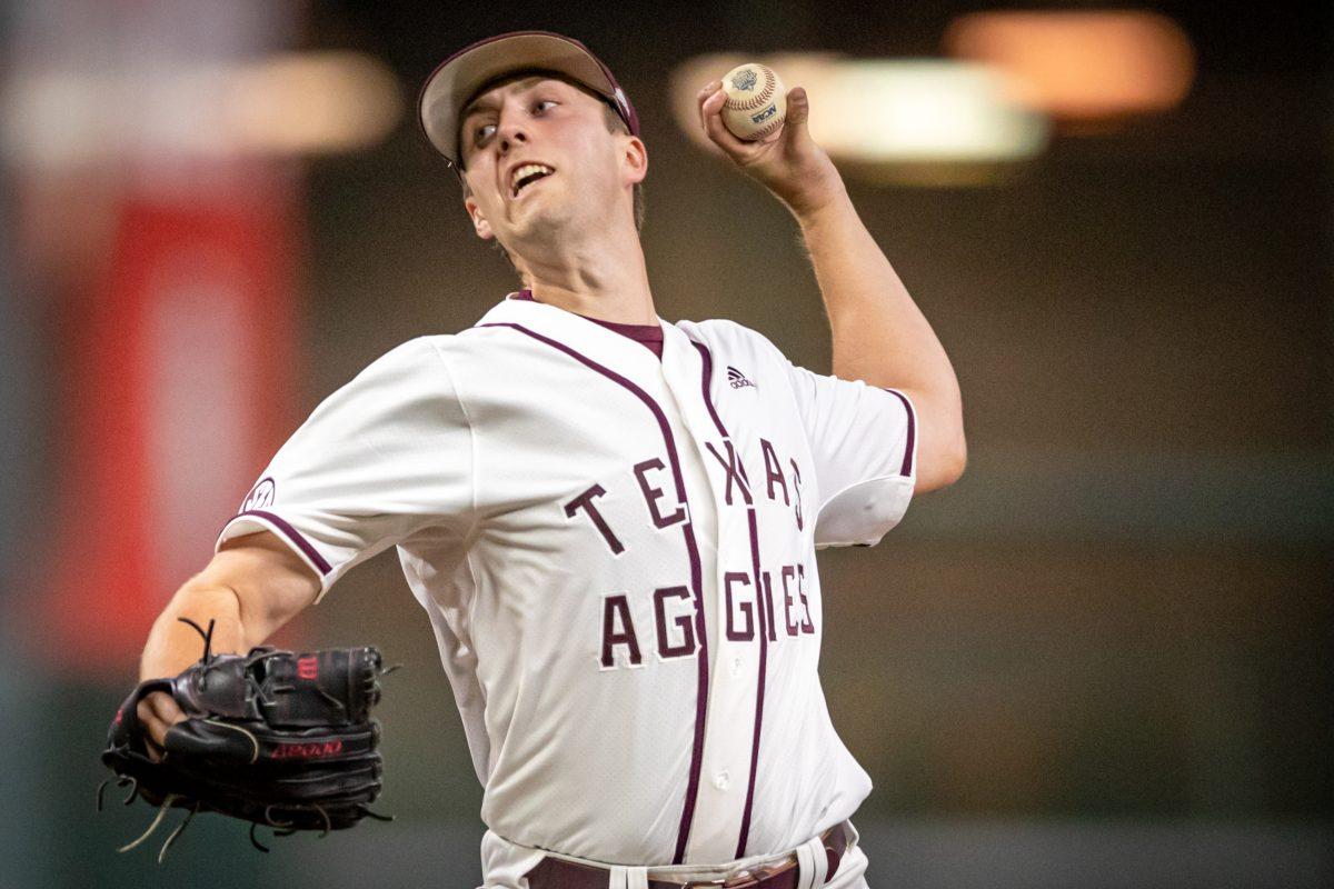 Sophomore LHP Troy Wansing (19) pitches from the mound during Texas A&Ms game against Rice at Minute Maid Park in Houston, Texas, on Saturday, March 4, 2023.