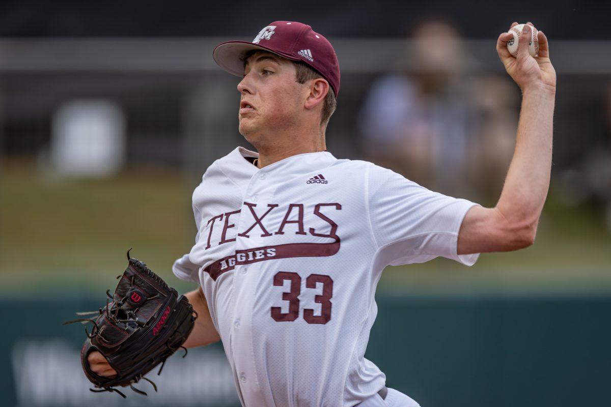 Freshman LHP Justin Lamkin (33) throws a pitch from the mound during Texas A&Ms game against UTRGV at Olsen Field on Tuesday, May 9, 2023.