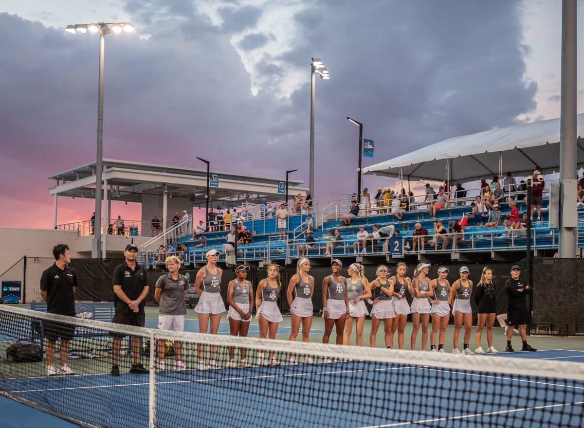 The team and coaches line up before a game vs. Stanford at the NCAA Women's Tennis quarterfinals in Orlando, Florida on Wednesday, May 17, 2023.