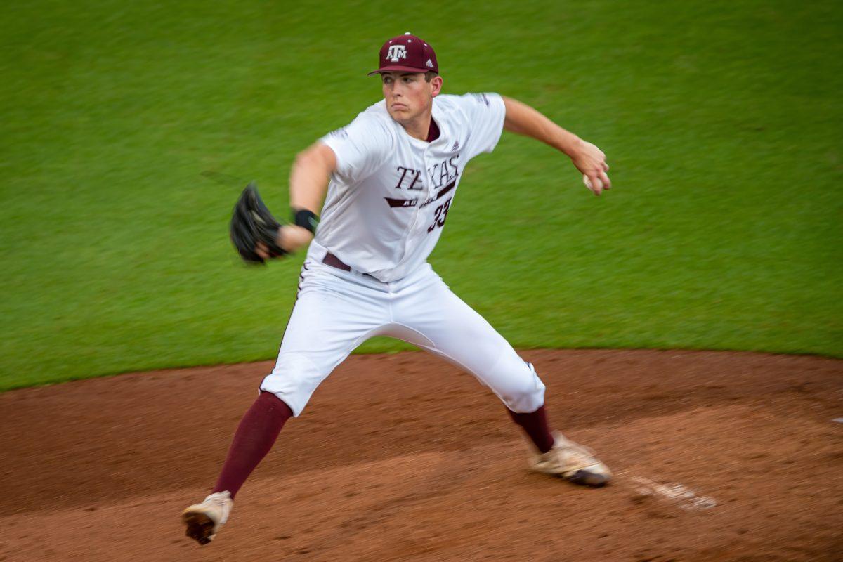 Freshman LHP Justin Lamkin (33) throws a pitch from the mound during Texas A&amp;M's game against UTRGV at Olsen Field on Tuesday, May 9, 2023.