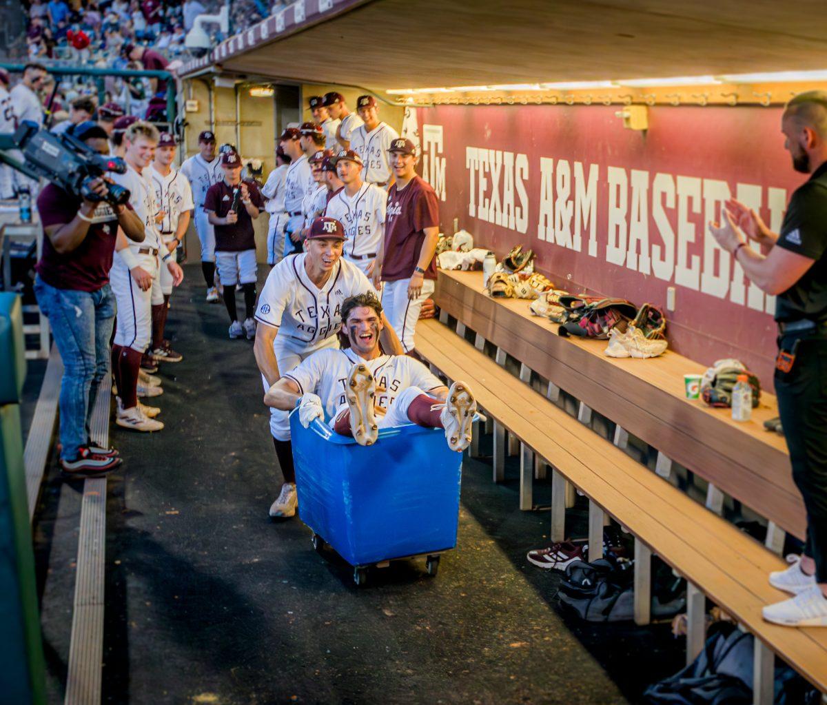 Freshman OF Jace LaViolette (17) gets pushed in a cart after a home run during the 8th inning during a game vs. Alabama on Friday, May 12, 2023 at Blue Bell Park.
