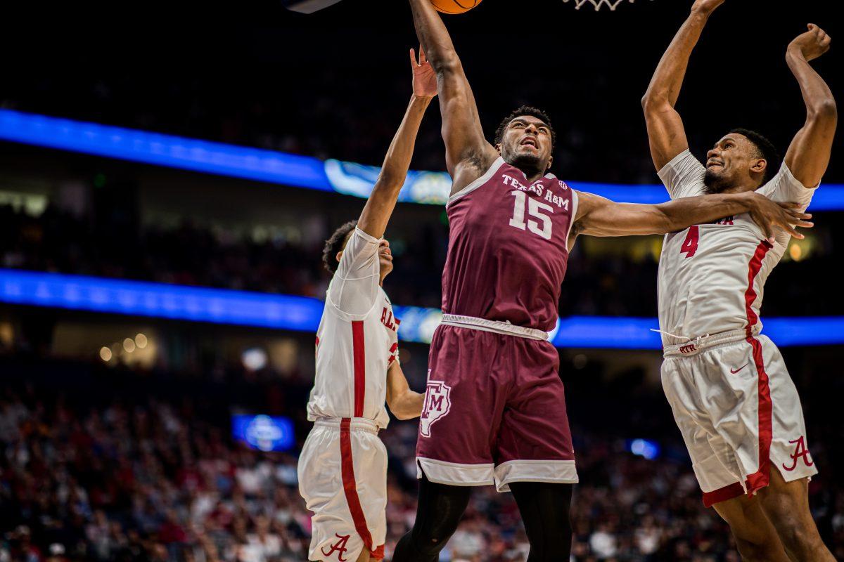 Junior F Henry Coleman (15) tries to shoot a basket during a game vs. Alabama on March 12, 2023 at Bridgestone Arena in Nashville Tennessee.