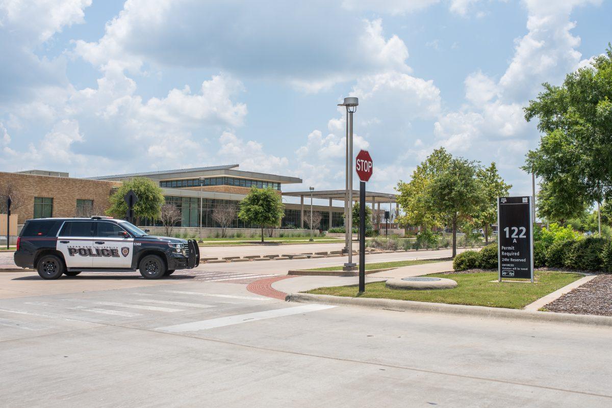 A police car stands on the perimeter of White Creek Apartments blocking the entrance on Thursday, June 1, 2023.