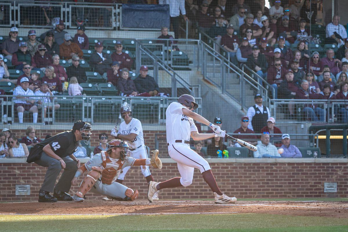 Freshman LF Jace LaViolette (17) hits an RBI single during Texas A&Ms game against Texas at Olsen Field on Tuesday, March 28, 2023.