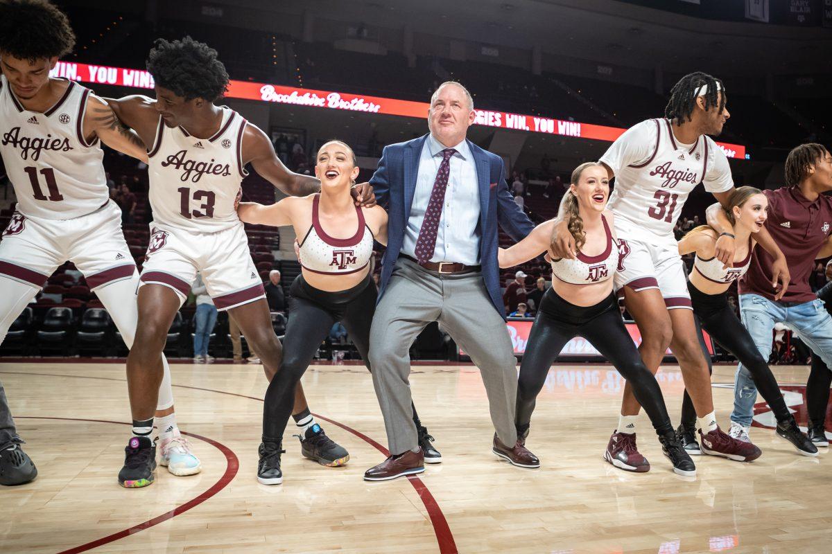 <p>Coach Buzz Williams saws off varsity's horns after the Aggies blew out SMU at Reed Arena on Wednesday, Nov. 30, 2022.</p>