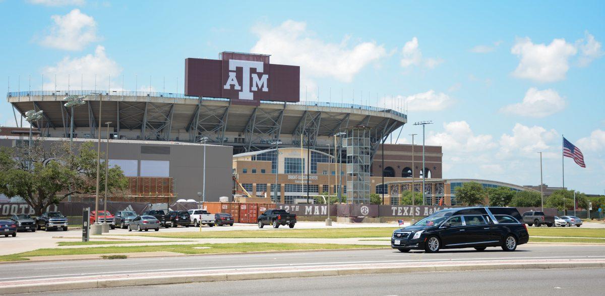 The funeral procession for Texas A&M defensive line coach Terry Price makes a final drive past Kyle Field on Saturday, July 8, 2023.