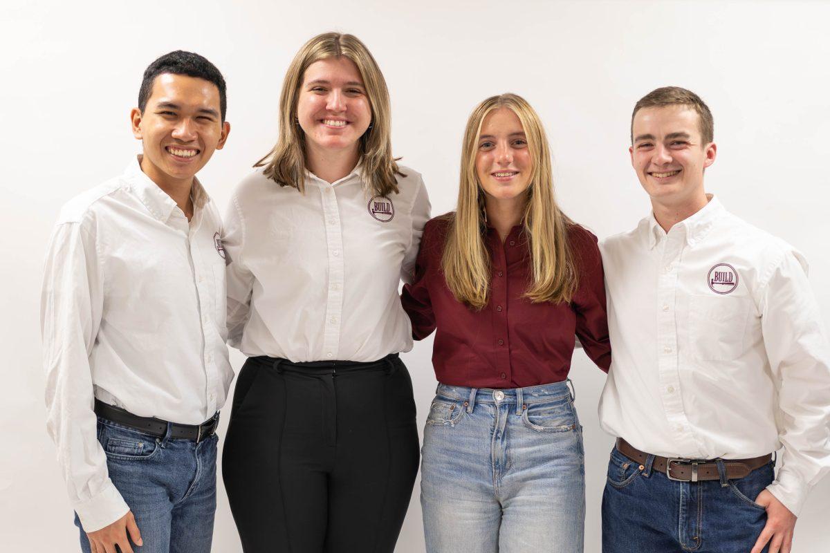 <p>BUILD CFO Albert Tran, CEO Kate-Riley Rogers, Marketing Team Leader Lauryn Kastenschmidt, COO Chase Parrish stand for a photo in The Battalion Studio. </p>