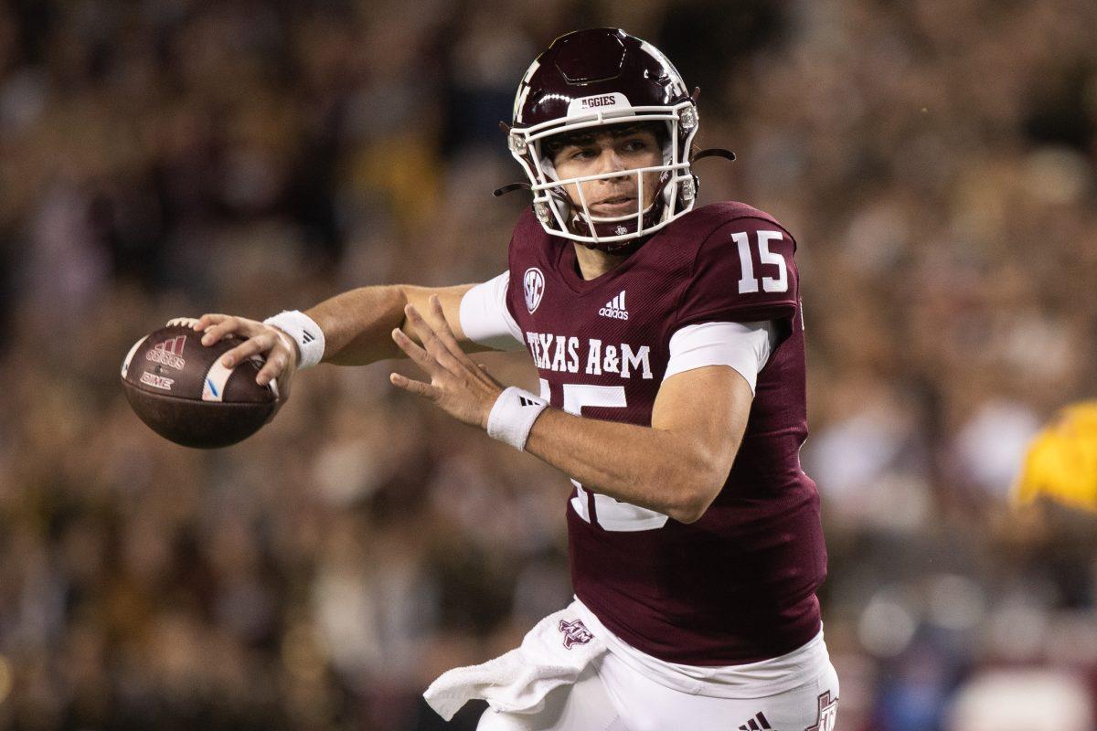 Freshman QB Conner Weigman (15) winds up a throw during A&Ms game against LSU at Kyle Field on Saturday, Nov. 26, 2022. (Cameron Johnson/The Battalion)