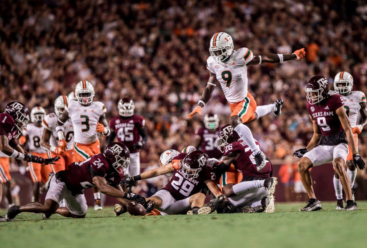 <p>Senior LB Sam Mathews (24) reaches to grab the ball in Texas A&M's game against Miami at Kyle Field on Saturday, Sept. 17, 2022.</p>