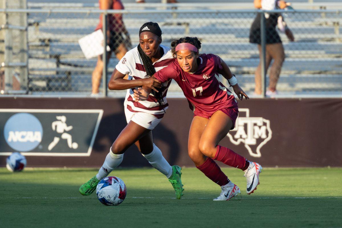 Junior F MaKhiya McDonald (5) attempts to keep possession of the ball against Florida State M/D Amelia Van Zanten (17) during a match at Ellis Field on Thursday, Aug. 17, 2023. 