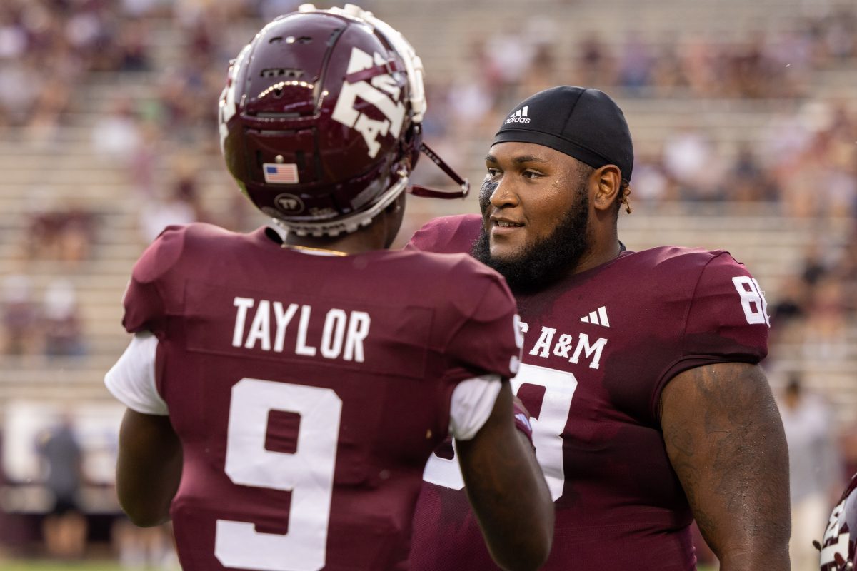 Freshman DL Samu Taumanupepe (88) talks with redshirt freshman DB Bobby Taylor (9) before the start of Texas A&Ms football game against ULM at Kyle Field on Saturday, Sept. 16, 2023.
