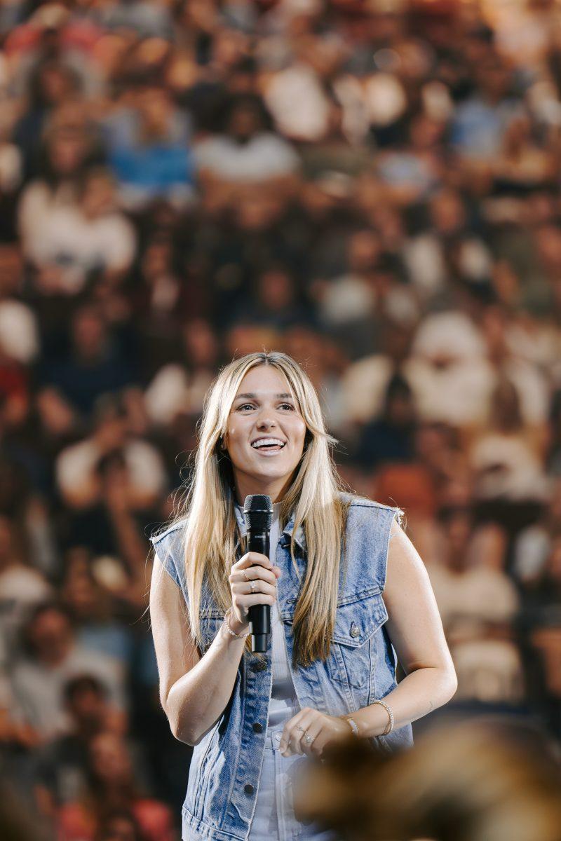 <p>Sadie Robertson Huff speaking at Breakaway Ministries in Reed Arena on Tuesday, Sept. 26, 2023.</p>