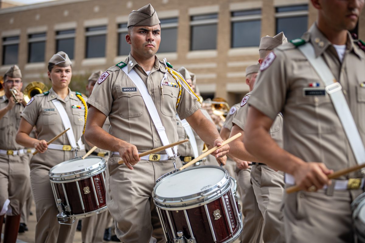 <p>A member of the drumline plays during the march-in at Kyle Field before Texas A&M's football game against Auburn on Saturday, Sept. 23, 2023.</p>