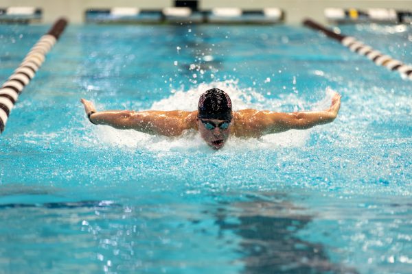 <p>Sophomore IM/back Baylor Nelson wins first in the Men 100 Fly during Texas A&M's swim meet against UIW on Friday, Sept. 29, 2023 at Rec Center Natatorium. (CJ Smith/The Battalion)</p>