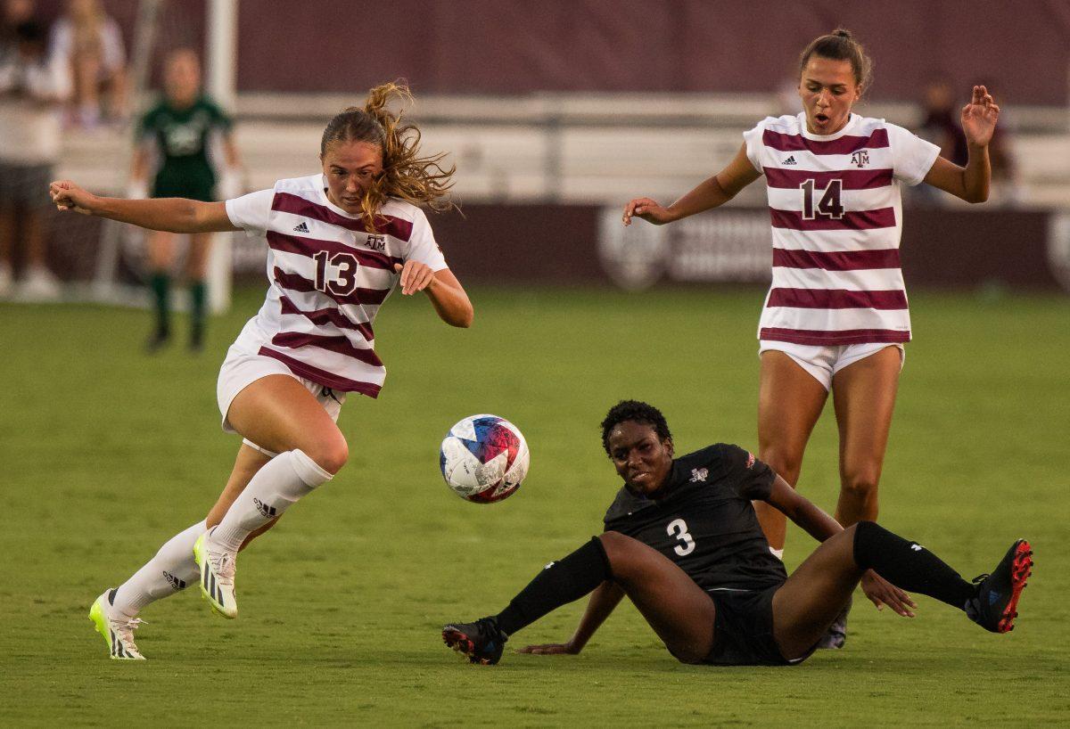 Junior M/D Mia Pante (13) goes for the ball after Junior M Carissa Boeckman (14) fouls Texas Southern D Akiya Saine (3) at Texas A&Ms game against Texas Southern at Ellis Field on Sunday Sept. 17, 2023. (Connor May/The Battalion)