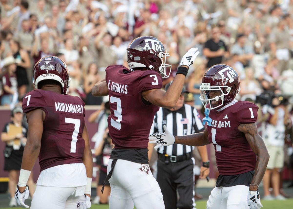 Sophomore WR Noah Thomas (3) celebrates with sophomore WR Evan Stewart (1) and junior WR Moose Muhammad III (7) after scoring his first of three touchdowns during a game vs. New Mexico on Saturday, Sept. 2, 2023.