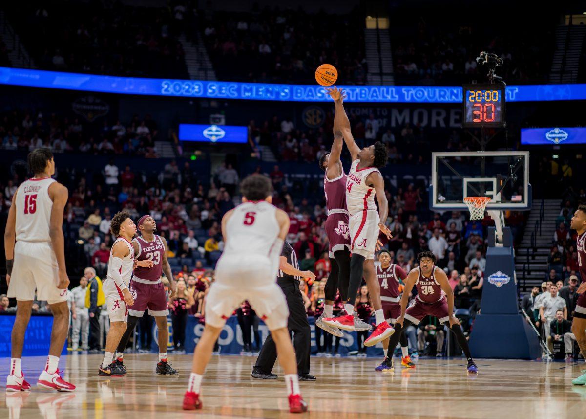 <p>Alabama C Charles Bediako and junior F Henry Coleman jumps for the ball at the begenning of the game during a game vs. Alabama on March 12, 2023 at Bridgestone Arena in Nashville Tennessee.</p>