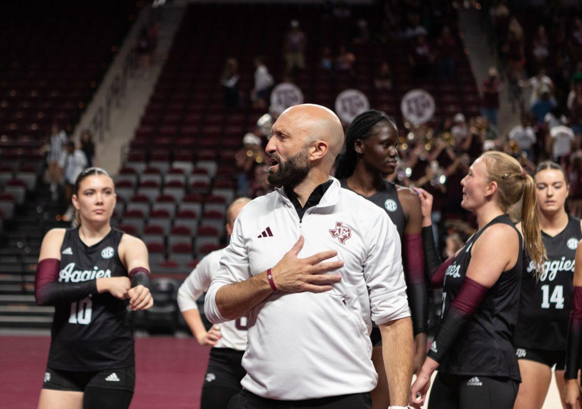 Coach Jamie Morrison huddles the team after Texas A&amp;M's loss against TCU at Reed Arena on Saturday, Sept. 9, 2023.