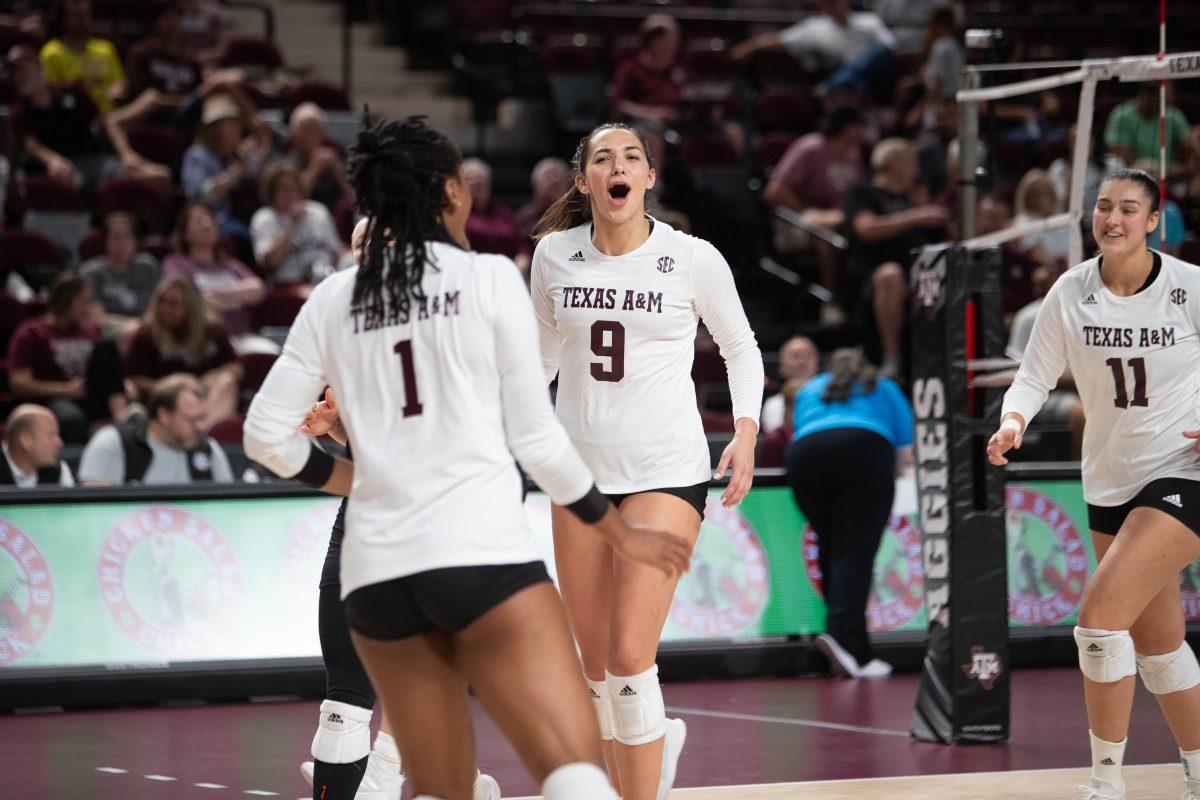 Sophomore OPP Logan Lednicky (9) celebrates with her team after scoring in Texas A&Ms game against Utah State on Thursday, Sept. 7, 2023 at Reed Arena. (Julianne Shivers/ The Battalion)