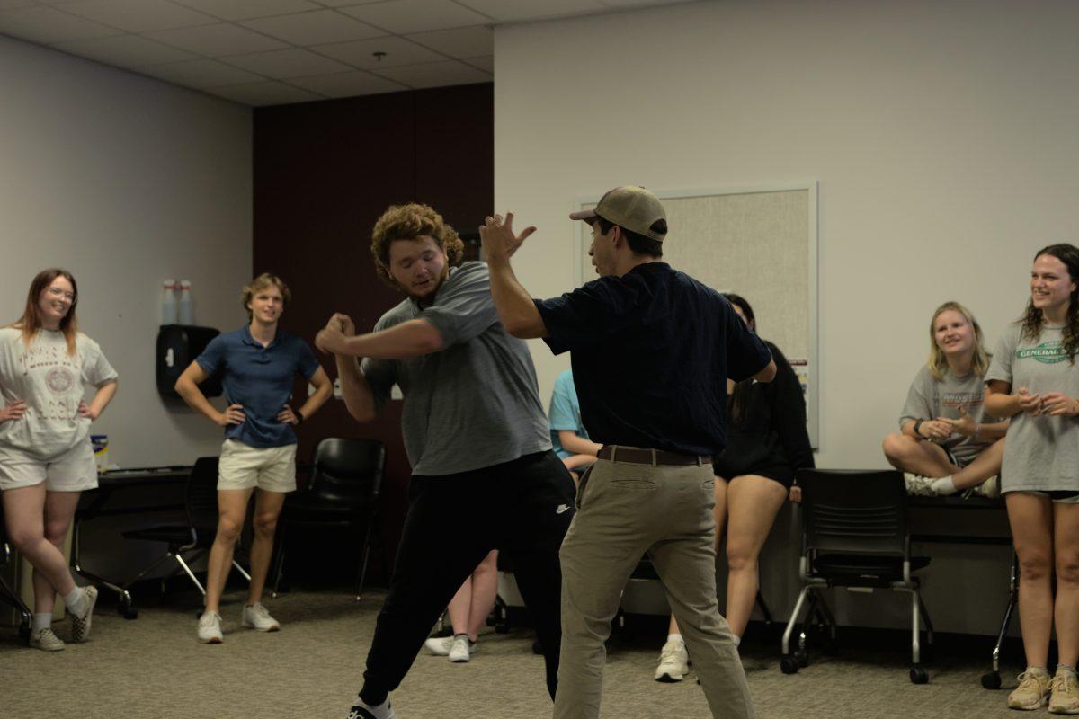 Telecommunication Media-Studies Junior Stephen Ashburn and Industrial Engineering Senior Omar Diaz Miron perform a scene for the other members at the Freudian Slip Improv Troupe practice meeting on Sunday, Sept. 10, 2023.