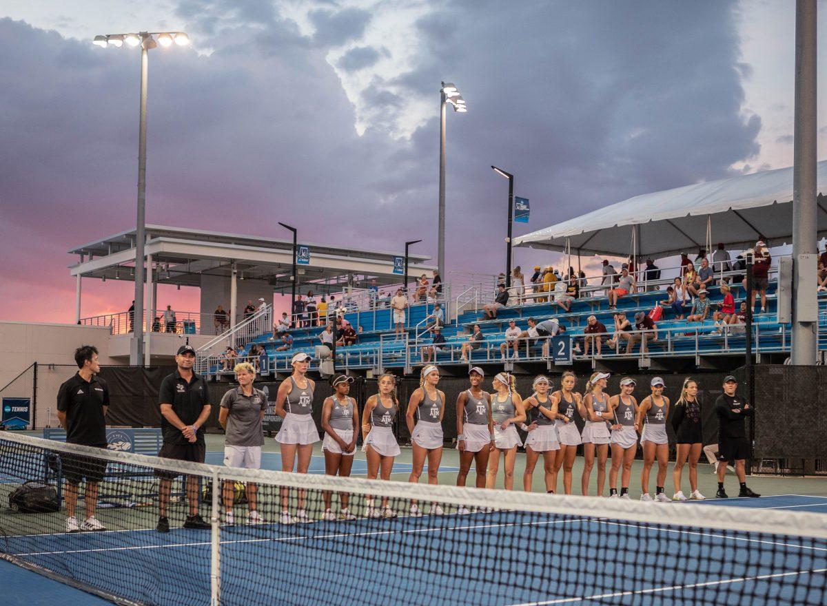 The team and coaches line up before a game vs. Stanford at the NCAA Womens Tennis quarterfinals in Orlando, Florida on Wednesday, May 17, 2023.