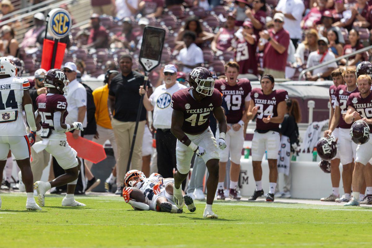 <p>Junior LB Edgerrin Cooper (45) celebrates after making a tackle for loss during Texas A&M's game against Auburn on Saturday, Sept. 23, 2023 at Kyle Field. (CJ Smith/The Battalion)</p>