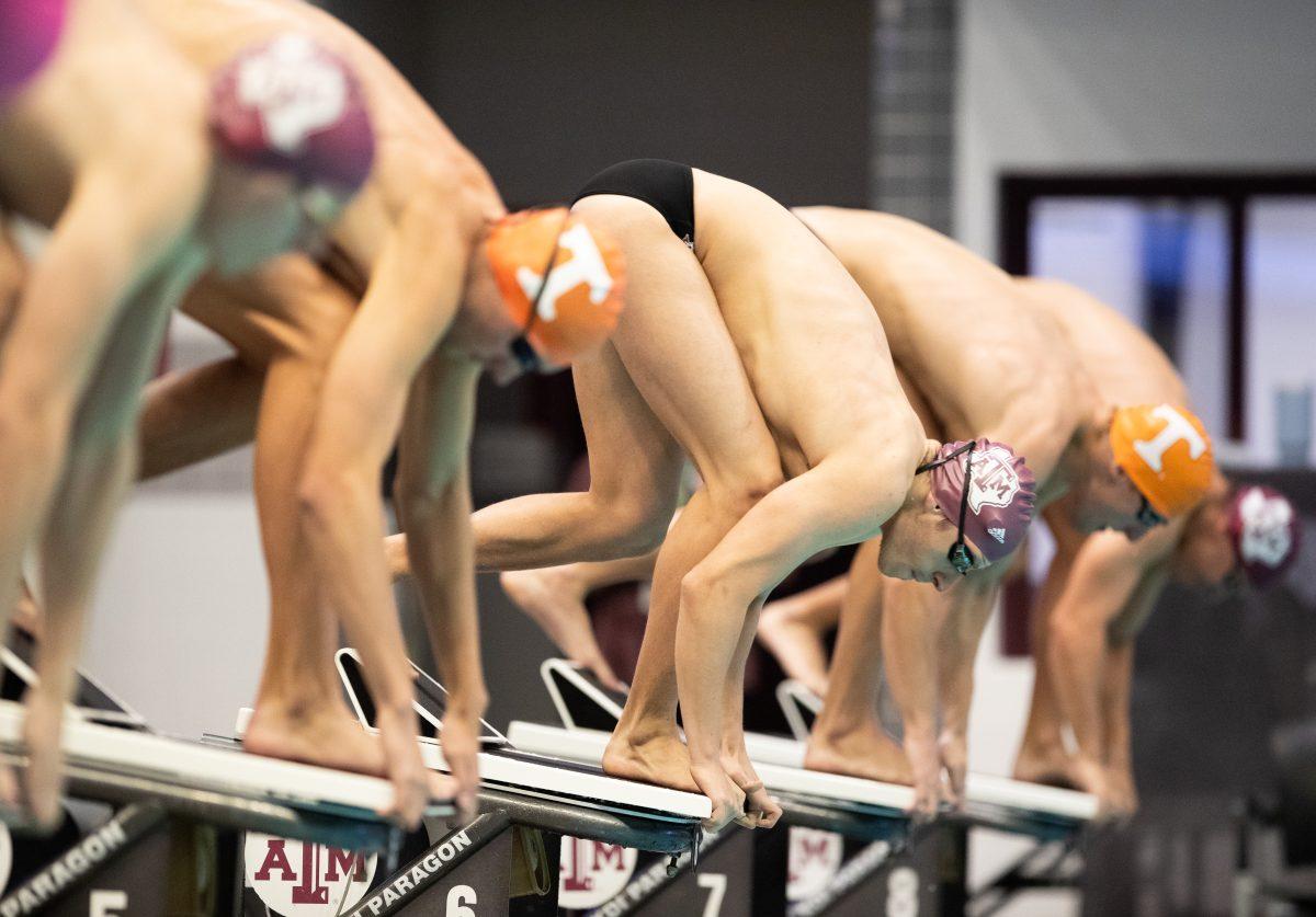 Swimmers line up in anticipation of the beginning of their race during Texas A&Ms meet against Tennessee on Friday, Oct. 27, 2023 at Rec Center Natatorium (Katelynn Ivy/The Battalion)