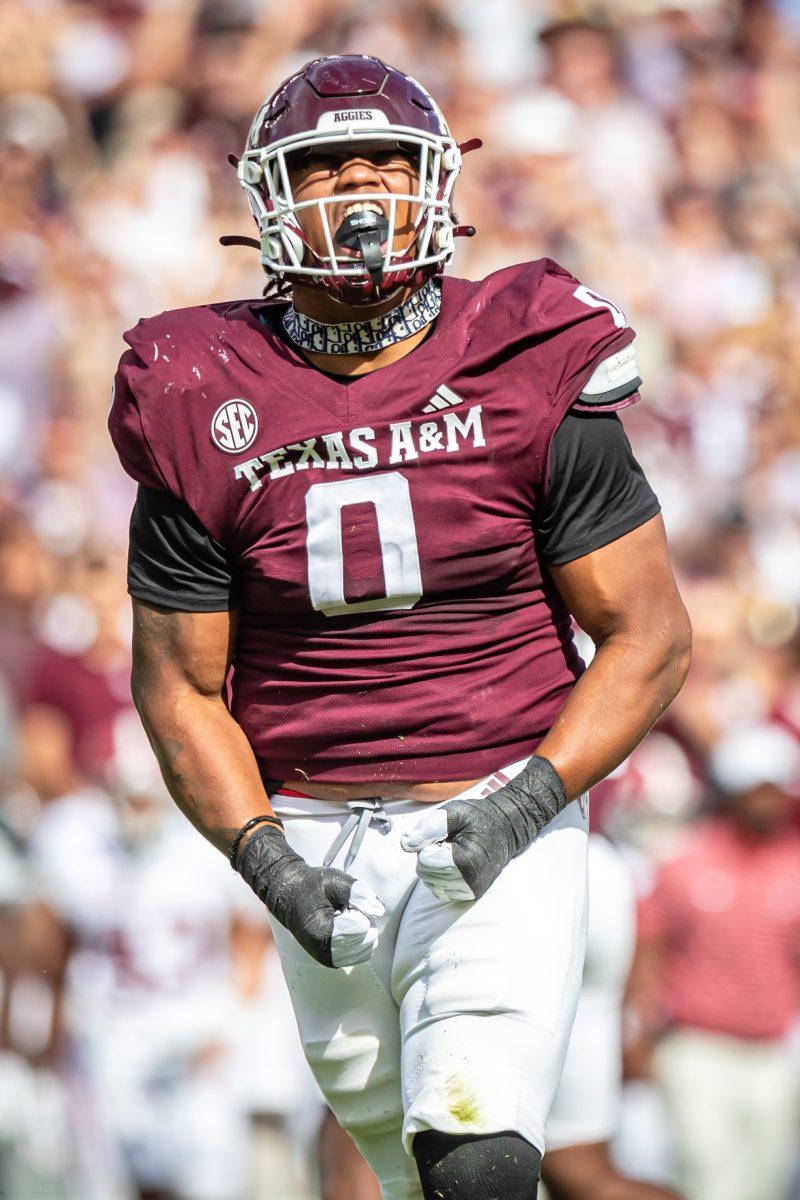 Sophomore DL Walter Nolen (0) celebrates after sacking Alabama QB Jalen Milroe (4) during Texas A&Ms football game against Alabama at Kyle Field on Saturday, Oct. 7, 2023. (Megan Williams/The Aggieland)