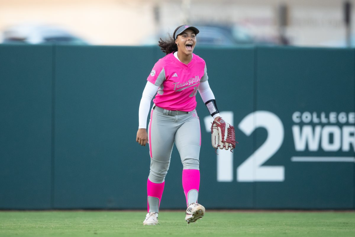 Sophomore OF Keely Williams (18) cheers after P Emiley Kennedy gets the final out of the first inning at the scrimmage against McClennan College on Tuesday Oct.24, 2023 at Davis Diamond. (Julianne Shivers/ The Battalion)