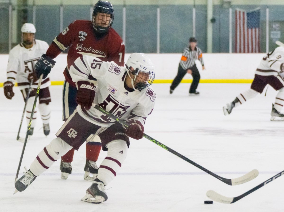 Senior Forward Matthew Perri (15) attacks zone during Texas A&amp;M's game against Metro State Univeristy - Denver on Friday Oct. 13, 2023 at Spirit Ice Arena.