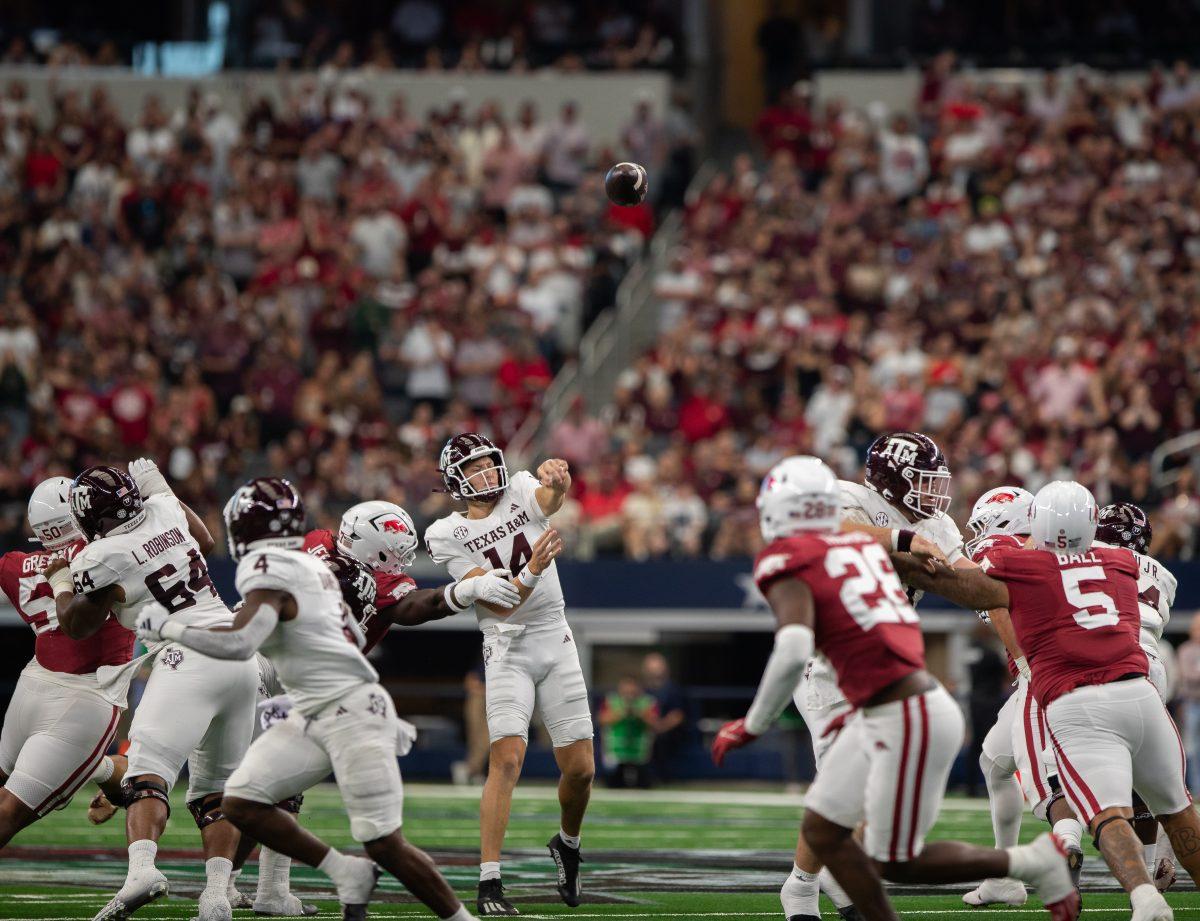 <p>Sophomore QB Max Johnson (14) throws during the Southwest Classic against Arkansas on Saturday, Sept. 30, 2023. (Kyle Heise/The Battalion)</p>