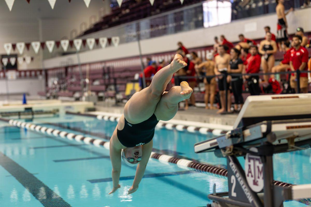 Sophomore+free%2Ffly+Hadley+Beeson+jumps+into+the+water+in+the+Women+100+Free+during+Texas+A%26amp%3BMs+swim+meet+against+UIW+on+Friday%2C+Sept.+29%2C+2023+at+Rec+Center+Natatorium.+%28CJ+Smith%2FThe+Battalion%29