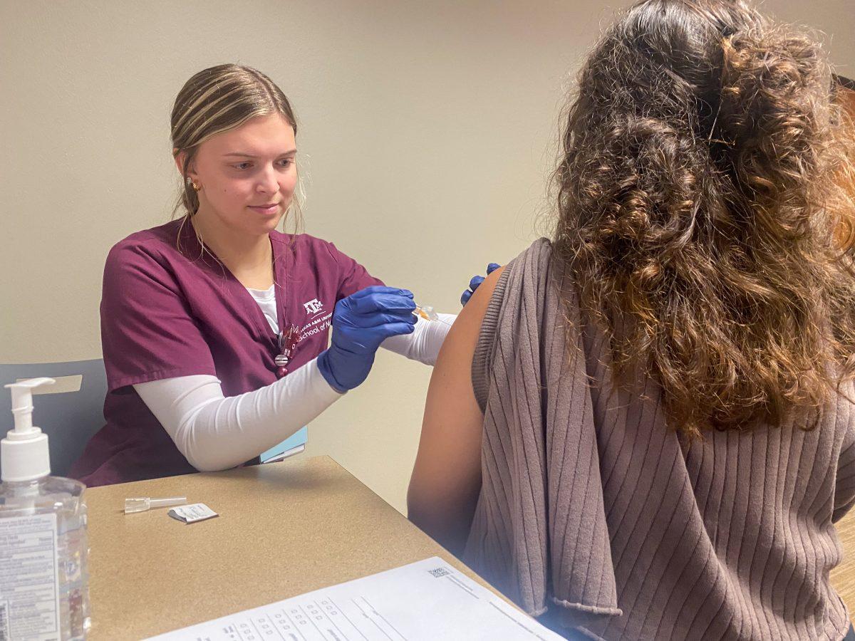 Texas A&M student nurse administers a flu shot to a patient on Thursday, Oct. 5, 2023 at Beutel Student Health Center. (CJ Smith/The Battalion)