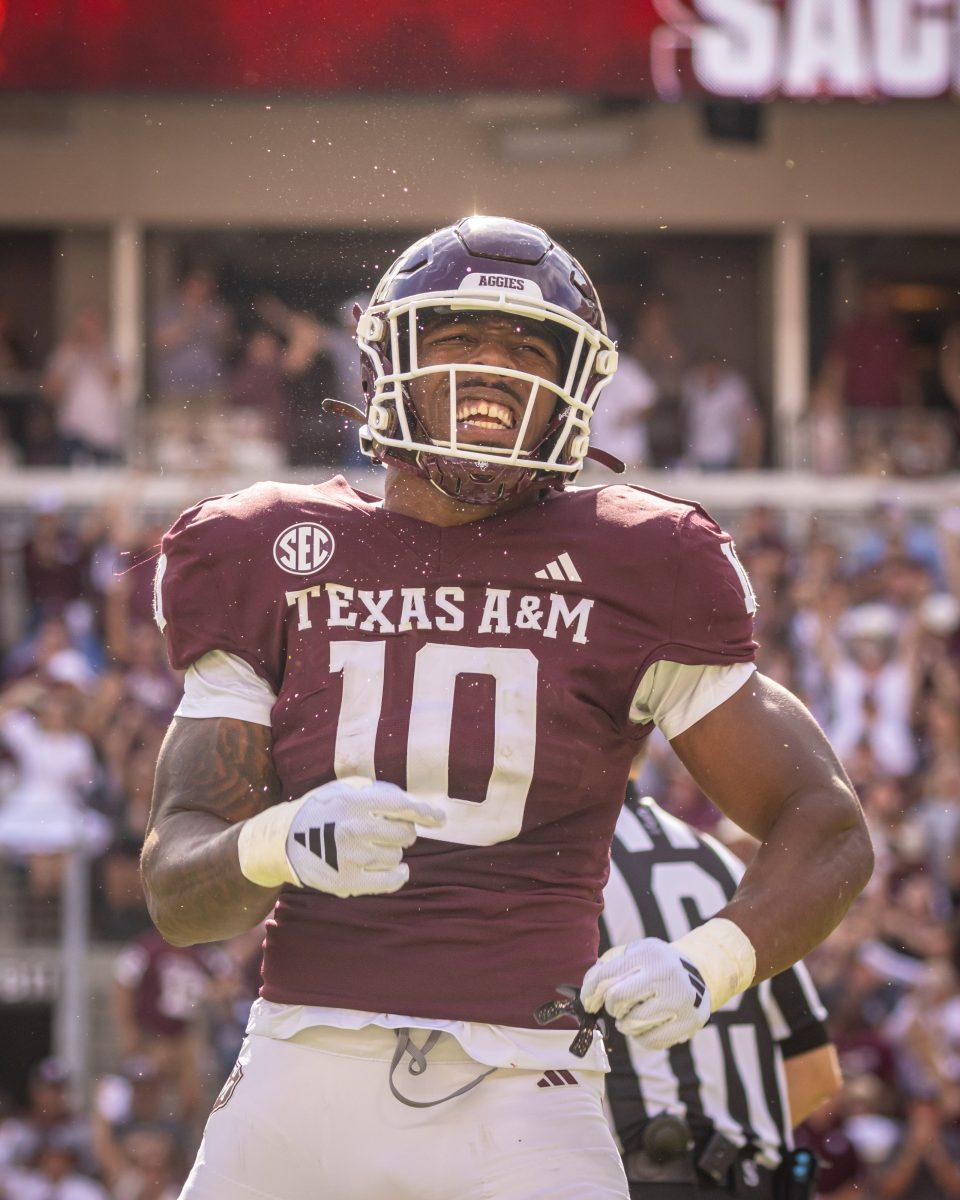 <p>Junior DL Fadil Diggs (10) celebrates after sacking Alabama QB Jalen Milroe (4) during Texas A&M's football game against Alabama at Kyle Field on Saturday, Oct. 7, 2023. (Chris Swann/The Battalion)</p>