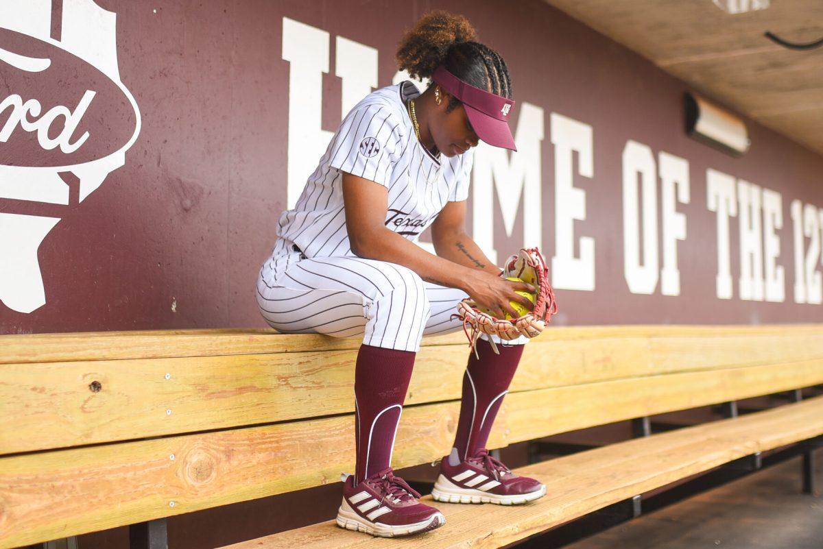 Junior IF Koko Wooley (3) poses in the dugout for a preseason interview on Thursday Oct. 12, 2023 at the Davis Diamond. (Julianne Shivers/ The Battalion)