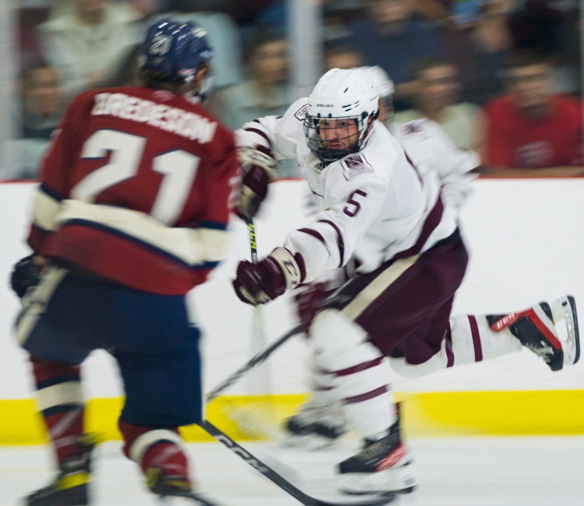 Senior Forward Daniel Dufresne (5) takes a shot during Texas A&Ms game against Metro State Univeristy - Denver on Friday Oct. 13, 2023 at Spirit Ice Arena.