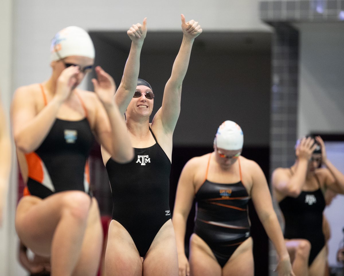 Aggie+swimmer+gives+thumbs+up+to+fans+before+beginning+her+race+during+Texas+A%26amp%3BMs+meet+against+Tennessee+on+Friday%2C+Oct.+27%2C+2023+at+Rec+Center+Natatorium+%28Katelynn+Ivy%2FThe+Battalion%29