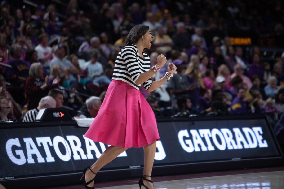 Head coach Joni Taylor cheers for her team during Texas A&Ms game against LSU at Reed Arena on Sunday, Feb. 05, 2023.