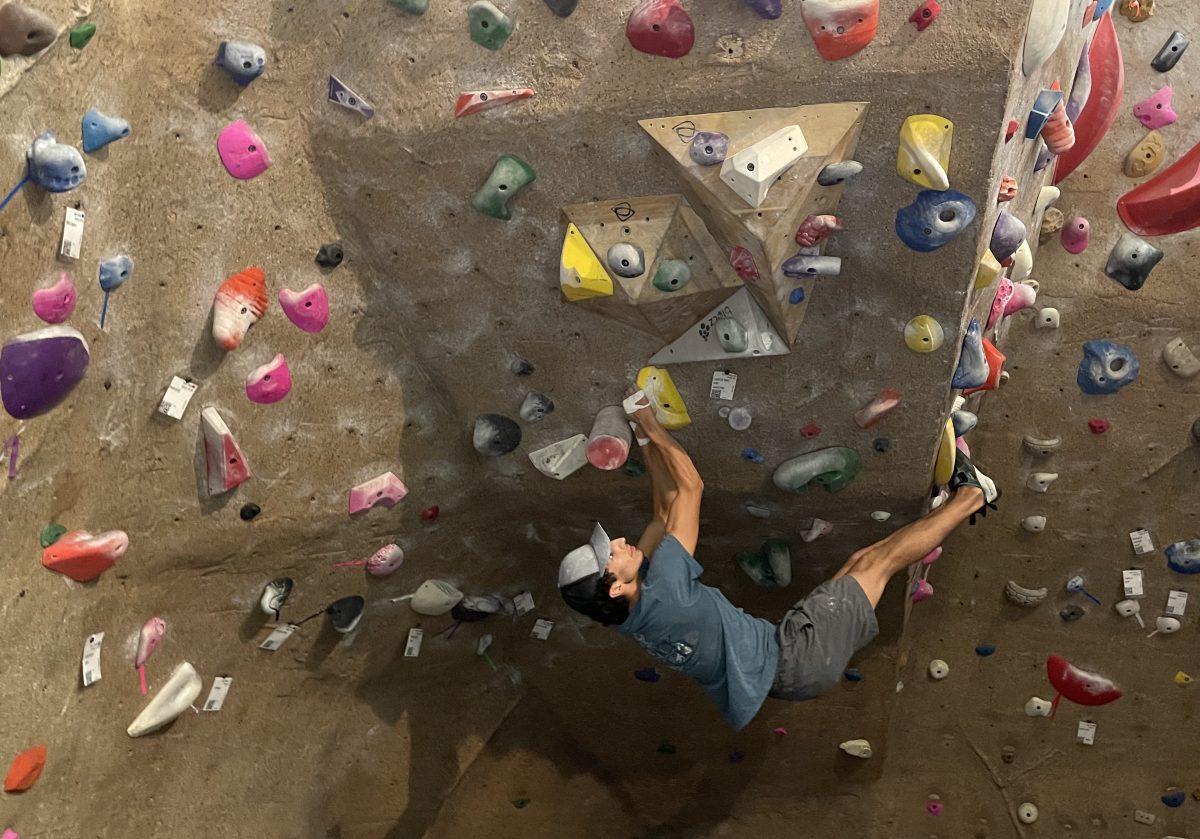 Industrial distribution sophomore Peyton Martinez climbs the bouldering wall during practice on Oct. 1, 2023 at A&M’s Student Rec Center.