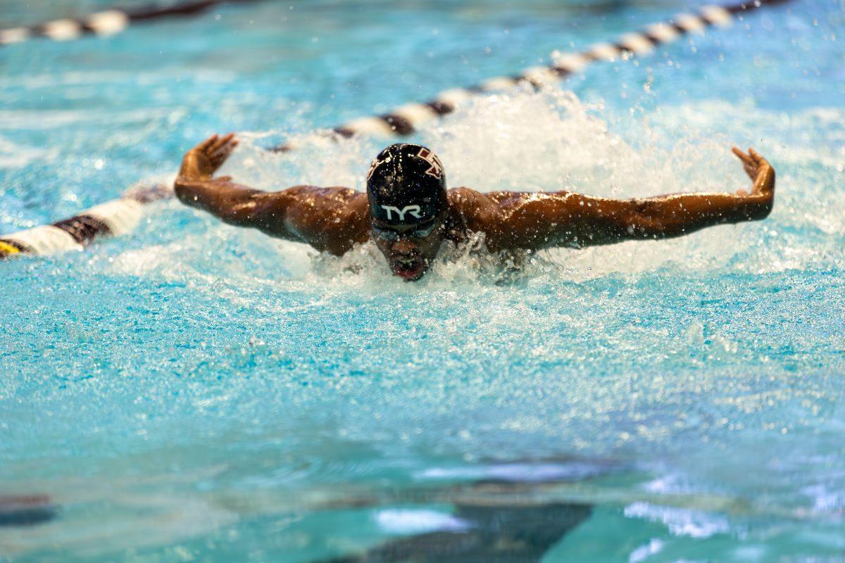 A Texas A&M swimmer jumps out of the water in the Men 200 Yard Medley Relay during Texas A&Ms swim meet against UIW on Friday, Sept. 29, 2023 at Rec Center Natatorium. (CJ Smith/The Battalion)